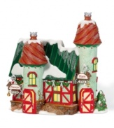 With the power and style of Prancer and Vixen, these North Pole stables offer a peek into lavish reindeer living. Lit from within, this porcelain collectible is amazingly detailed, with classic Christmas colors and freshly fallen snow.