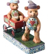 Two little bears crafted with the distinct folk art styling of Jim Shore lend whimsical splendor to your annual Christmas celebration.