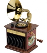 A beautiful replica of an antique gramophone, this piece from Mr. Christmas features interchangeable disks that play 12 Christmas classics performed by renowned artists such as Bing Crosby, the Andrews Sisters and Eartha Kitt. Battery operated.