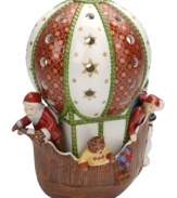 Up and away! Much more than a votive holder, this Villeroy & Boch hot air balloon carries special passengers to all your holiday celebrations with a distinct vintage feel. Pierced detail allows candlelight to stream through.