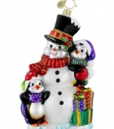 Two little penguins snuggle up to a close family friend in warming winter scene boasting the exceptional detail and craftsmanship of all Christopher Radko Christmas ornaments.