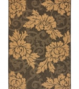Reflecting the natural tones and textures of its surroundings, this versatile flat-weave area rug from Safavieh adds lush style to any indoor or outdoor space.
