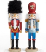 Attention! The soldier nutcrackers from Kurt Adler stand tall and proud, clad in uniforms that shimmer like the season in bright red and starry blue.