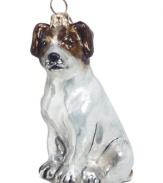 Puppy love at first sight. Just begging for a home, this Jack Russell terrier ornament is irresistible to animal lovers in hand-painted glass by Joy to the World.