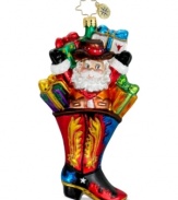Merry Christmas, ya'll! Santa kicks the holidays off right in a Texas-sized boot from Christopher Radko. Hand-painted flame and star detail from heel to toe, plus chili pepper and cactus wrapping paper, make it must-have.