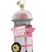 Sugarcoat it. A cotton candy machine that's straight from the county fair is a welcome surprise for everyone around your tree. Painted to perfection, the Christopher Radko ornament features a hot pink hue with glitter accents.