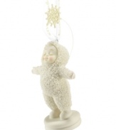 Let it snow! A sweet Snowbaby enjoys the snow in this lovely ornament from Department 56, bringing the lasting holiday tradition to your home this season. Crafted of pure porcelain bisque.