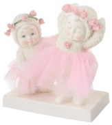 Getting prepared for the annual dance recital, these Snowbabies take a moment to practice. Crafted of porcelain bisque from Department 56.