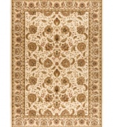Taking its namesake from the original Kashan rugs of Persia, this area rug displays a regal look with intricate medallions in a light gold, cream, sage colorway with hints of crimson. Made in the USA of lush, heat-set polypropylene for sheer durability and effortless style.