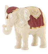 Finely detailed, this Nativity Elephant from Lenox is crafted of porcelain with an engraved red blanket upon his back, trimmed in gold.