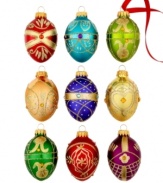 Rich and elaborate, Kurt Adler's bejeweled egg ornaments offer a mix of new and traditional hues with unique patterns rendered in gold and silver glitter.