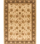 Taking its namesake from the original Kashan rugs of Persia, this area rug displays a regal look with intricate medallions in a light gold, cream, black colorway with hints of crimson. Made in the USA of lush, heat-set polypropylene for sheer durability and effortless style.