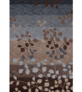 Inspired by the beauty of the natural landscape, the Studio rug from Dalyn adds undeniable drama to your living space. With a floral pattern accenting gorgeous layered hues of mocha, sky and midnight blue, the rug is hand tufted for incredibly plush texture.