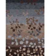 Inspired by the beauty of the natural landscape, the Studio rug from Dalyn adds undeniable drama to your living space. With a floral pattern accenting gorgeous layered hues of mocha, sky and midnight blue, the rug is hand tufted for incredibly plush texture.