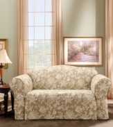 In fair Verona. Flowers and vines dance across a solid duck background for a fresh take on traditional elegance in the Verona loveseat slipcover from Sure Fit. Choose from soothing tones of sage or cocoa.
