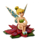 Jim Shore brings his unique folk art-inspired creativity to a beloved Disney character. Tinkerbell on Holly Leaf figurine will be a treasured gift for children and collectors alike.