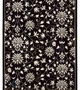 Global mystique: inspired by the first 18th-century oriental designs to arrive in Europe, this exquisite rug is steeped in history. Hand-tufted of the finest wool and hand-carved for detail, the sophisticated black and white rug is a pleasure both to the eye and the touch.
