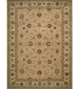 Introduce a combination of elegant Persian and European designs to your traditional home décor with this remarkable Nourison area rug. Hand-tufted with exceptional technique, this natural wool area rug features strands of genuine silk for exquisite detail that redefines luxury.