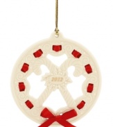 All wrapped up in a holiday bow, this graceful wreath ornament makes a memorable gift for 2012. With carved candy canes, holly and pretty scrolling detail in Lenox porcelain.