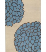In full bloom. This artist-designed area rug from Surya features whimsical florals set in a palette of deep, rich colors. Hand-tufted from exceptionally soft New Zealand wool, the brilliant use of high and low pile adds texture and dimension.