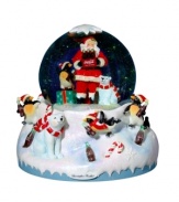 Celebrate an icon. Christopher Radko pays tribute to the 125th anniversary of Coca-Cola just in time for Christmas with a snow globe featuring Santa and his drink of choice chilling at the North Pole.