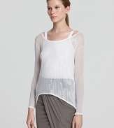 Flaunting an ethereal aesthetic, this sheer Helmut Lang top is an elegant piece to elevate staples and pair with statement looks. As perfect for day as it is for evening, its chic versatility is not often come by.