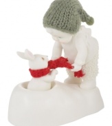 A tiny baby offers his scarf to a friend in need in this Snowbabies figurine. Crafted of porcelain bisque from Department 56.