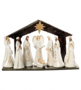 Each piece beautifully crafted of pure white porcelain, this glowing nativity scene depicts the birth of Baby Jesus with Mary, Joseph and the divine angel watching over them. Embellished with gold details.