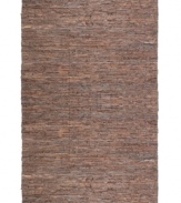Olé! Spice up your decor with the gorgeously festive style of the Matador rug from St. Croix. Durable leather strips in warm, earthy hues are meticulously hand woven with fine cotton strands, resulting in a beautiful, rustic texture and natural braided pattern that accents even the most eclectic decor.