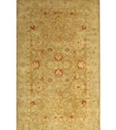 Lavish your space in timeless tradition, set in soft, earthy shades on this exquisite area rug from Safavieh. Tufted in India from pure wool, this rug emerges from the annals of antiquity to bring spectacular style and time-honored quality to your home. (Clearance)