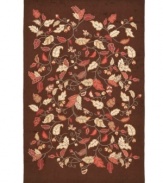 Natural whimsy. Perfectly graceful leaves upon scrolling vines make a mark of elegance upon rich woven pile. Hand tufted in India of long wool fibers, this luxurious area rug from Martha Stewart rugs presents unparalleled comfort and style underfoot.