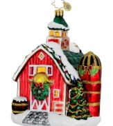 Enjoy a quiet Christmas in the country with the Festive Farm ornament. A classic red farmhouse is the picture of seasonal splendor, decorated with colorful lights, holiday greens and gold trim from Christopher Radko.