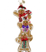 It all stacks up to one sweet Christmas tree. Three gingerbread men dusted in bronze glitter and decked with candy accents give this handcrafted Christopher Radko ornament its irresistible whimsy.