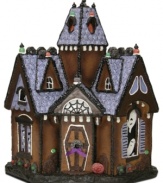 Built with the look of real gingerbread, colorful gumdrops and sugar-coated frosting, this Byers' Choice collectible is a sweet retreat for some, a haunted house for others.