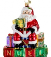 The cool kid on the block, Santa Claus gets the party started every Christmas with a message of noel. With the exquisite Polonaise glass and festive glitter of Christopher Radko ornaments.