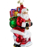 About to make his grand entrance, Santa Claus is the picture of merriment in this Polonaise glass ornament, featuring the dazzling brilliance of Christopher Radko.