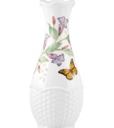 Crafted of elegant white porcelain, this Lenox bud vase combines the beloved Butterfly Meadow motif with a scalloped edge and textured accents for a look of country charm. Qualifies for Rebate