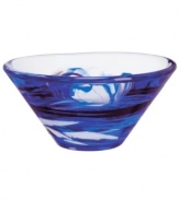A dramatic accent, the Tempera Blue bowl features heavy glass laced with hand-painted swirls of deep blue. Designed by Anna Ehrner for Kosta Boda.