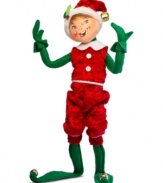 He'll be there with bells on. Sporting long elfin shoes and a velvety red jumpsuit, this irresistible figurine brings the joy of Christmas wherever he goes. With the crafted charm and soft, flexible features of Annalee dolls.