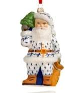 Filled with the charm of Christmas past, this Vaillancourt Santa Claus ornament is hand painted in a blue and white suit and trimmed in shimmering green and white glitter.