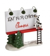 All signs point to a Chick-fil-A Christmas, including this billboard in Snow Village. The cows know – chikin is where it's at when it comes to a delicious holiday meal. Coordinates with the also-irresistible Chick-fil-A restaurant building by Department 56.