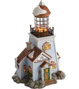 A New England must-have, the Snail Point Lighthouse is a waterfront essential. Set on a rocky landscape and dusted in a light covering of snow, this wintry retreat is an escape from the cold, emanating a seasonal warmth from bright windows and a glowing flame at top.