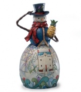 Collectors will adore this Snowman figurine with its signature Jim Shore details that evoke America of a bygone era. History buffs will appreciate the use of the pineapple, a holiday motif first popularized in Colonial Williamsburg.