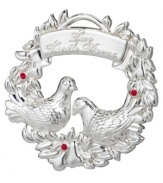 Feather your holiday nest with the Two Turtle Doves ornament from Waterford. A gleaming silver-plated wreath and birds with ruby-red accents make for a merry Christmas tree.