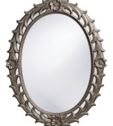 Pewter flowers form an elegant wreath around the Eileen oval mirror. Elaborate textural details and an intricate pattern on the inner rim add notes of refinement and classic appeal.