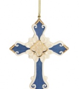 Be reminded of the meaning of Christmas with this cross ornament from Lenox, crafted of lovely porcelain with blue and gold embellishments. With gold hanging thread.