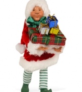 Wrap it up! He has his hands full, but Santa's little helper is filled with glee as he wraps an endless pile of Christmas presents. An adorable figurine with the unmistakable style of Byers' Choice.