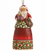 Santa makes an exception to his drop-and-go policy to hand-deliver a particularly special present. His kind eyes and warming spirit are irresistible in elaborately carved and hand-painted resin. A thoughtful gift for someone you love, from Jim Shore.