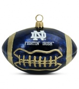 Team and Christmas spirit go hand in hand with the Notre Dame football ornament. Hand-painted glass is something students, alum and fans will cheer.