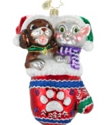 Bring a cat or dog in from the cold this season with the Pause for Paws charity ornament, handcrafted by Christopher Radko. These furry friends are just two of the animals eager to warm your home.